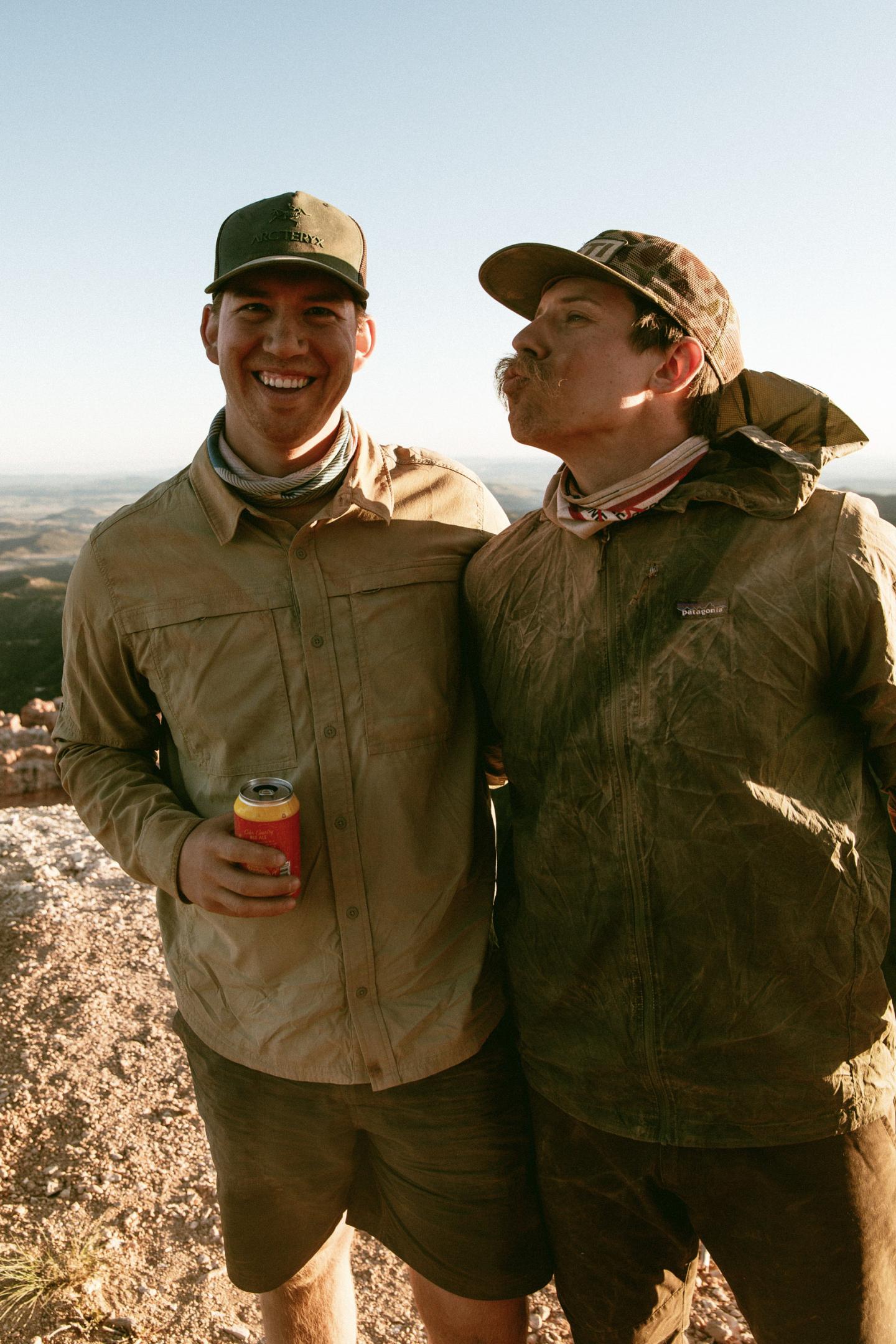 Two guys posing for a photo