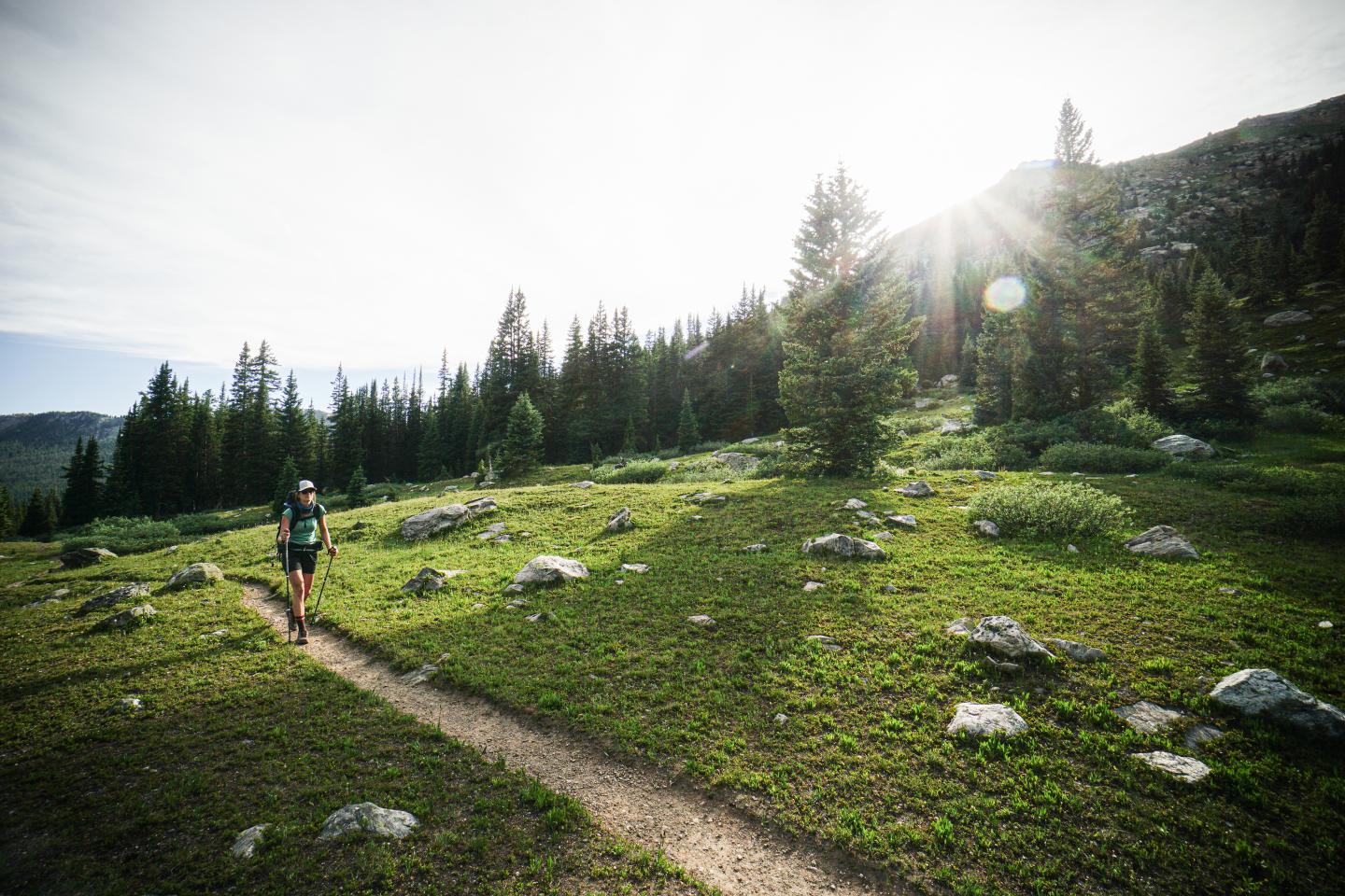 Girl hiking along a trail