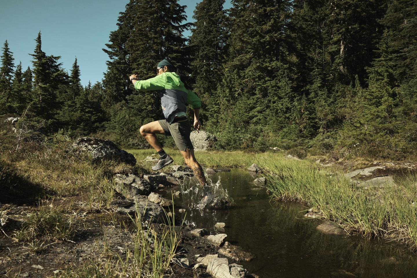 A person running through a puddle
