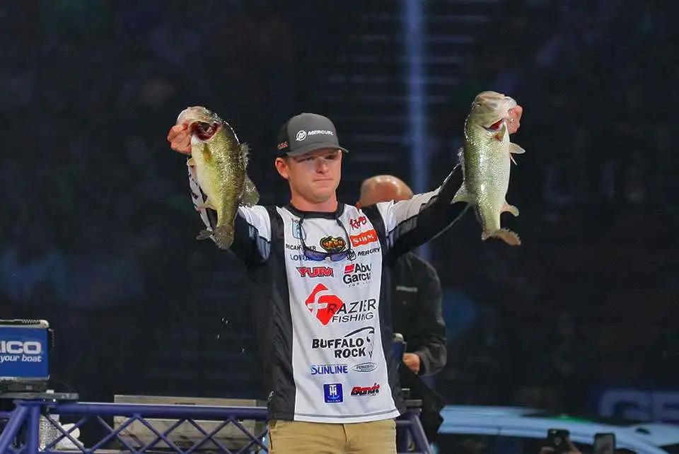 Man holding two fish