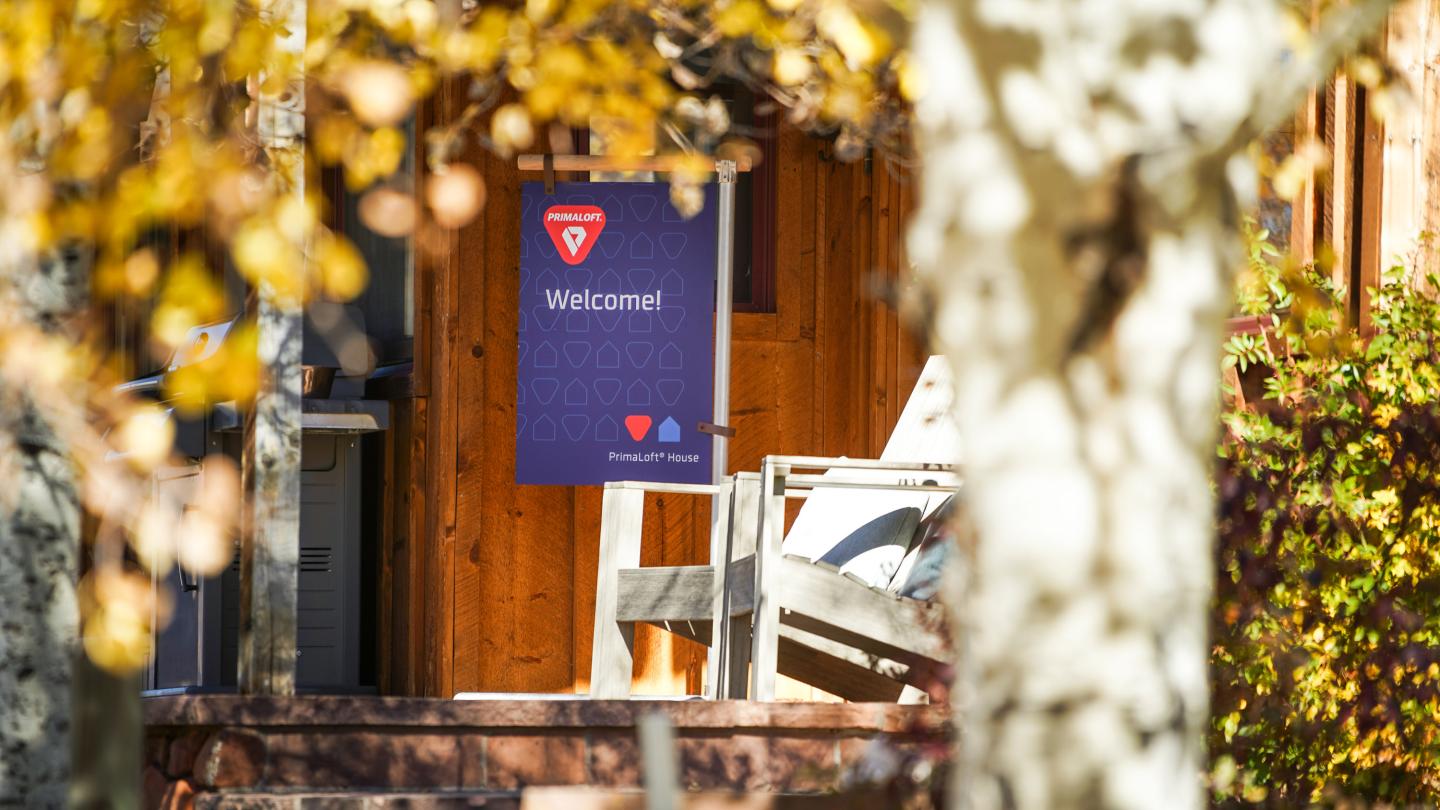 An entry to a house with a PrimaLoft sign