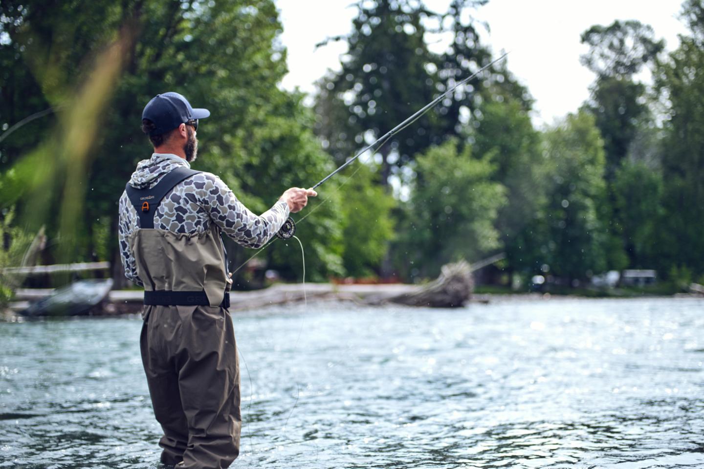 fly fisherman in a river