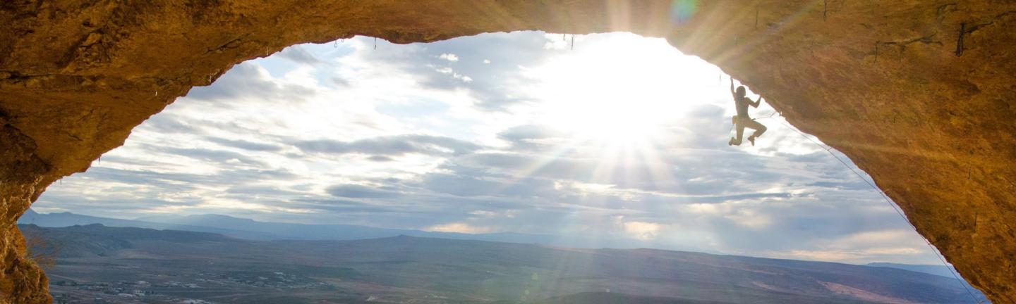Climbing with sun in background