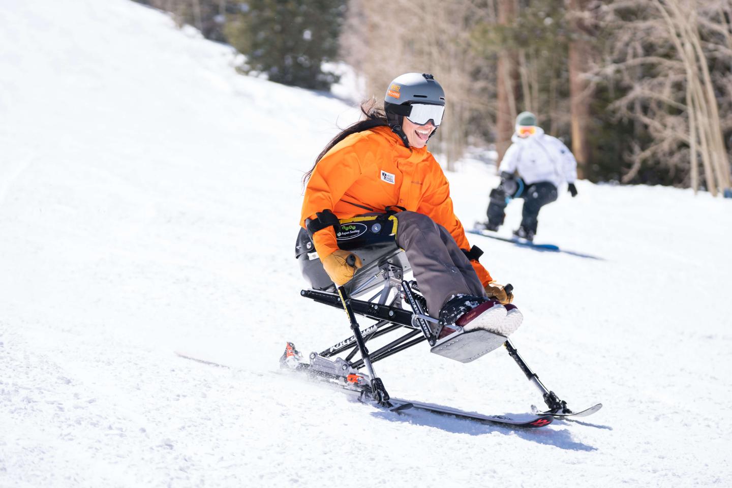 skier on adaptive ski