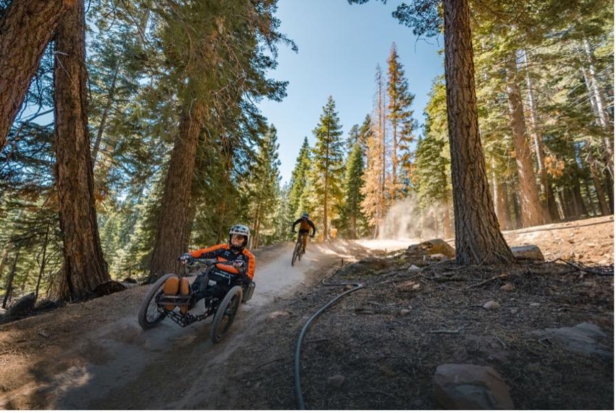 adaptive mountain bike rider on trail
