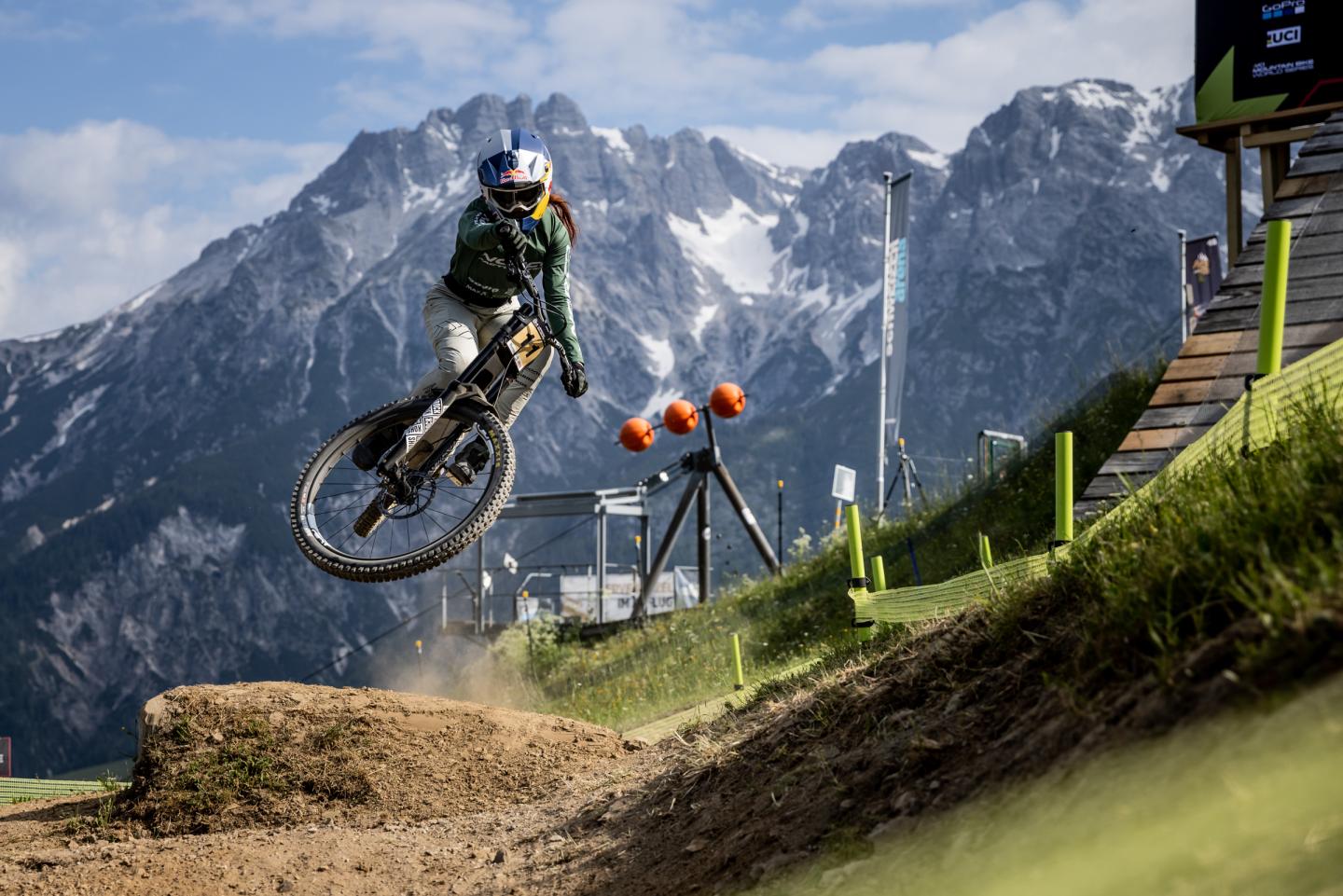 mountain biker going off jump