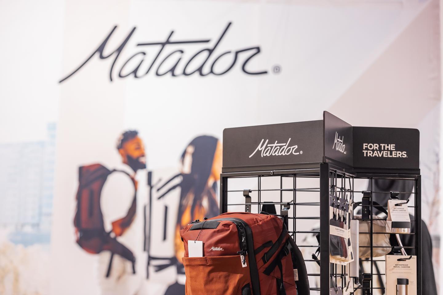 Store display featuring backpacks and a "Matador" logo.