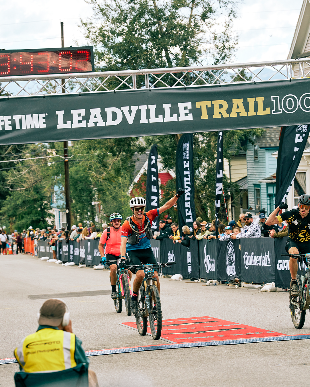 Cyclist crosses finish line at the Lifetime Leadville Trail 100 race.